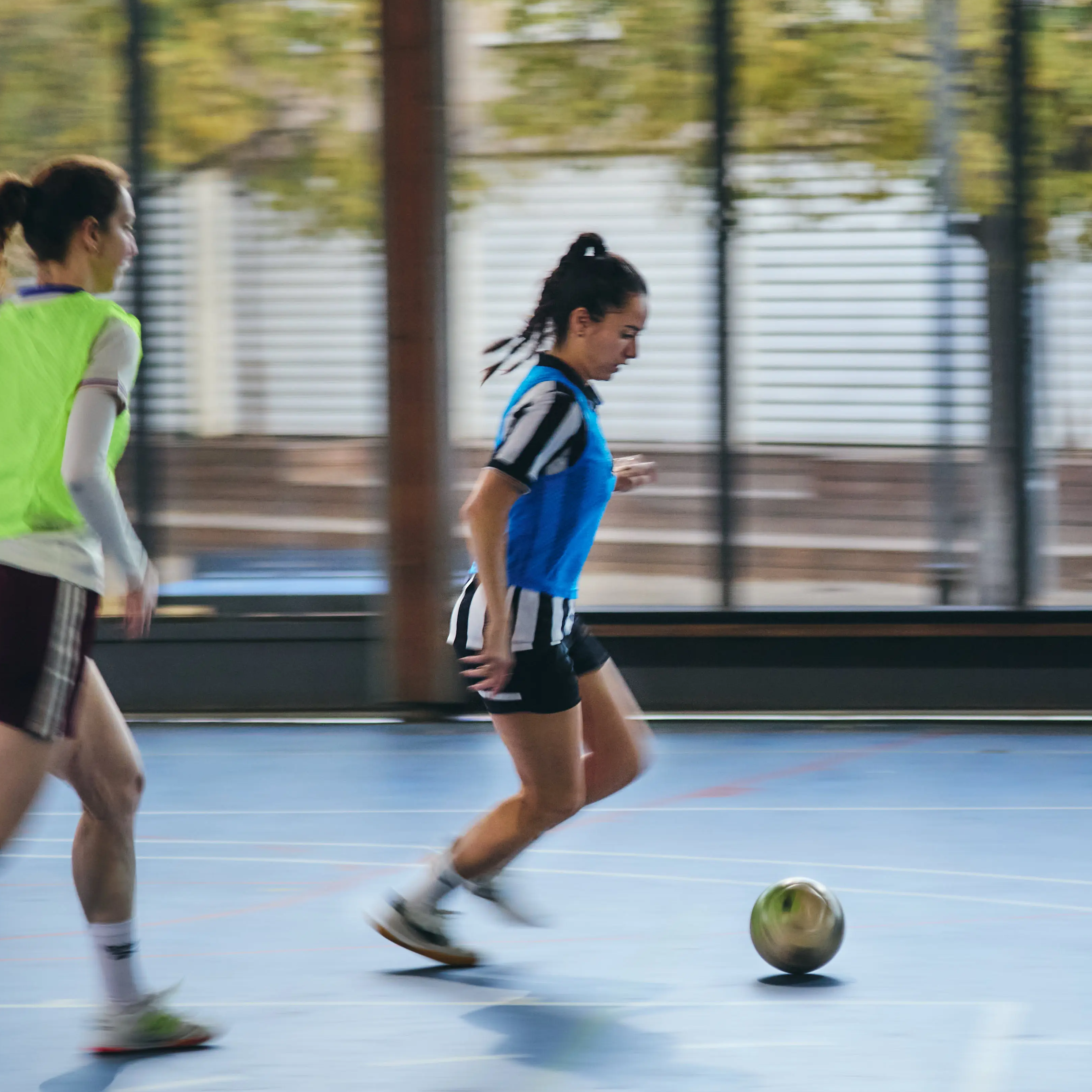 Women football in Barcelona - playing street football at Barceloneta courts